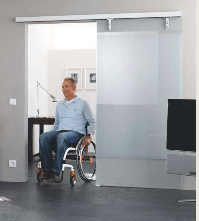 Automatic sliding door solution for persons with disabilities