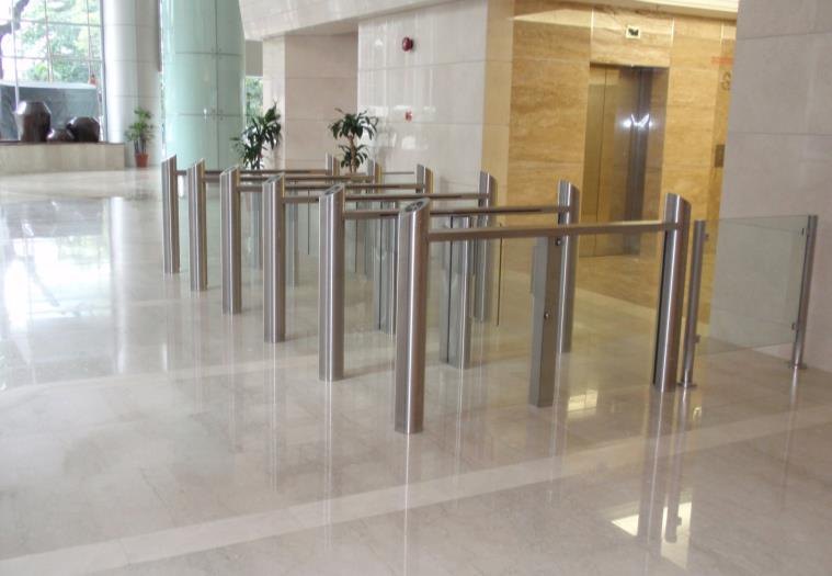 Sensor-controlled flap gates in a building lobby